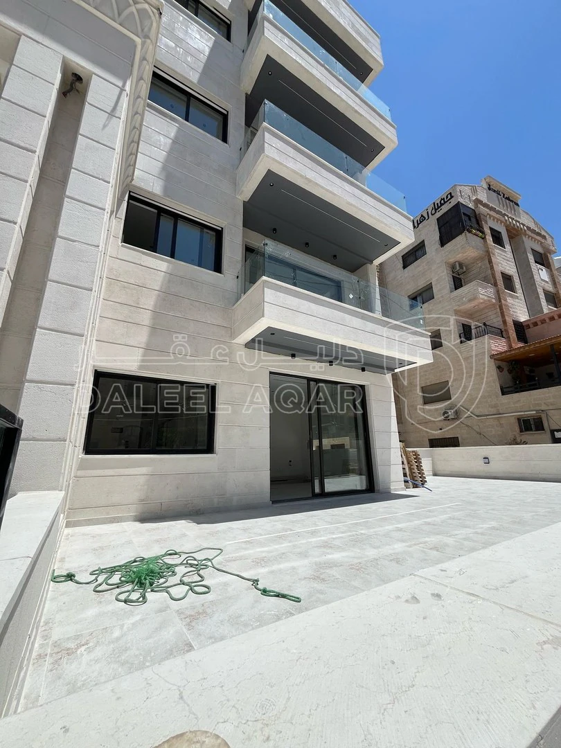 شقة في شقة للبيع في مرج الحمام بالقرب من دوار البرديني - 59,000 دأ - صورة 1